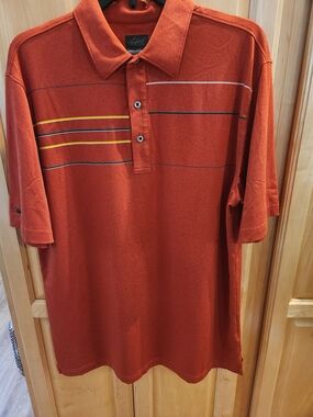 Greg Norman Collection Rust Orange Polo with Horizontal Stripe Accents